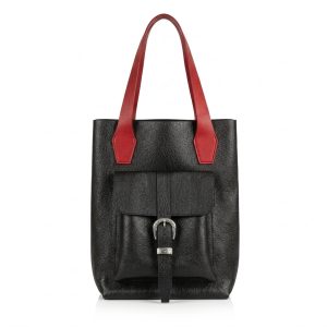 Front view of a black pebbled leather tote bag with red handles and a silver-buckled front pocket.